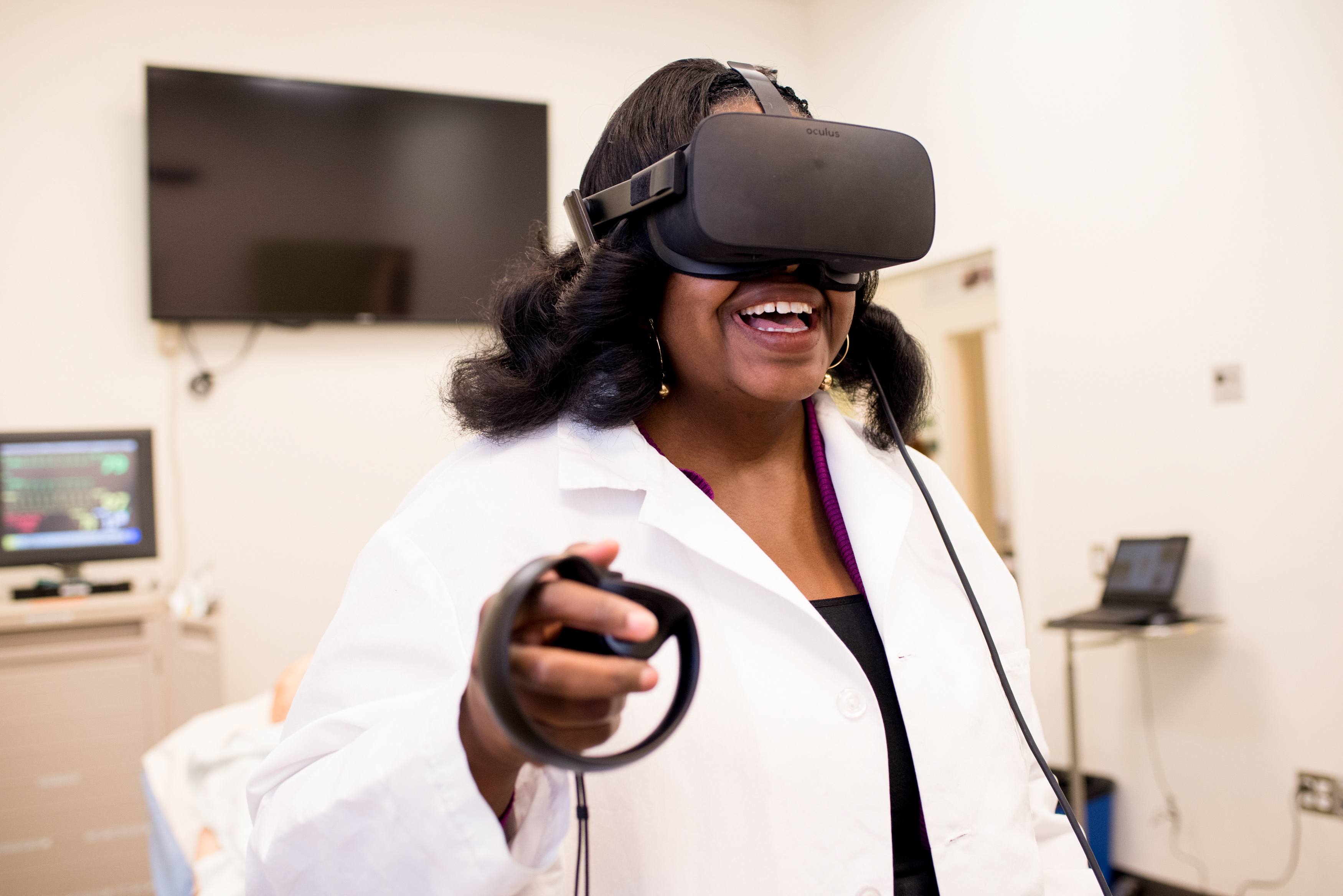 Physician testing virtual reality headset